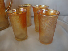 Load image into Gallery viewer, Vintage Jeanette Glass Marigold Carnival Treebark Beverage Pitcher with Lid and Eight Glasses Set
