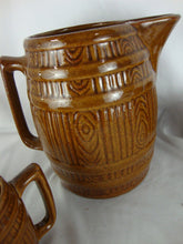 Load image into Gallery viewer, Vintage Unmarked McCoy Brown Barrel Pitcher with 4 Mugs Set
