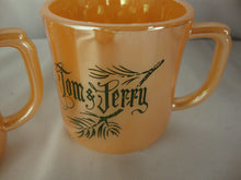 Load image into Gallery viewer, 1950s Fire King Peach Luster Tom &amp; Jerry Holiday Mugs Set of 4
