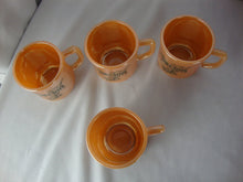 Load image into Gallery viewer, 1950s Fire King Peach Luster Tom &amp; Jerry Holiday Mugs Set of 4
