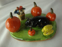 Load image into Gallery viewer, Lynn Bailey Folk Art Pottery Black Cat with Pumpkins and Flowers Figurine
