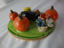 Load image into Gallery viewer, Lynn Bailey Folk Art Pottery Black Cat with Pumpkins and Flowers Figurine
