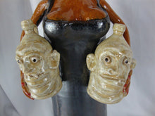 Load image into Gallery viewer, Marvin Bailey SC Potter Signed Folk Art Pottery Dark Woman in Dress with Two Face Jugs in Hands Jug
