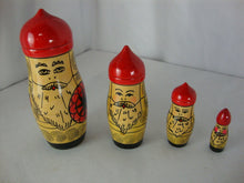 Load image into Gallery viewer, Vintage Handpainted Russian Matryoshka Classic Santa 4 Piece Nesting Doll Set
