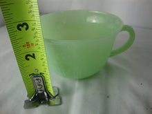 Load image into Gallery viewer, Vintage Fire King Jadeite Glass Alice Pattern Teacup and Saucer Set
