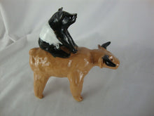 Load image into Gallery viewer, Lynn Bailey Pottery Tan Bull with Black White Pig on Back 6 Inch
