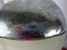 Load image into Gallery viewer, MCM retro Ice O Mat hand crank ice crusher with cream and red metal and plastic body with chrome flip top lid and handle. Crusher has wear/tear, finish loss, scratches, stains and measures about 8" height by 5" width by 4" depth.
