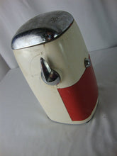Load image into Gallery viewer, MCM retro Ice O Mat hand crank ice crusher with cream and red metal and plastic body with chrome flip top lid and handle. Crusher has wear/tear, finish loss, scratches, stains and measures about 8" height by 5" width by 4" depth.

