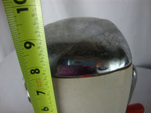 Load image into Gallery viewer, MCM retro Ice O Mat hand crank ice crusher with cream and red metal and plastic body with chrome flip top lid and handle. Crusher has wear/tear, finish loss, scratches, stains and measures about 8" height by 5" width by 4" depth.
