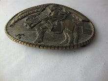 Load image into Gallery viewer, Vintage All Around Cowboy Monkey Cowboy on Horse Brass Oval Belt Buckle
