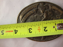 Load image into Gallery viewer, Vintage All Around Cowboy Monkey Cowboy on Horse Brass Oval Belt Buckle
