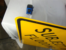 Load image into Gallery viewer, Retired DOT Road Subject To Flooding Square Yellow Black Road Man Cave Sign
