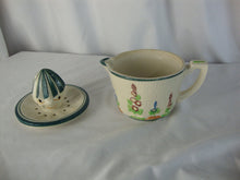 Load image into Gallery viewer, 1950s Japan Ceramic Face Floral Handled Juicer
