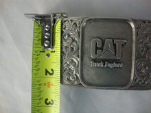 Load image into Gallery viewer, Vintage CAT Truck Engines USA Made Scrollwork Belt Buckle

