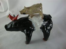 Load image into Gallery viewer, Lynn Bailey Folk Art Pottery Black White Bull Tan Pig on Back Cardinal on Neck 5 Inch Figurine
