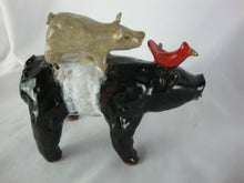 Load image into Gallery viewer, Lynn Bailey Folk Art Pottery Black White Bull Tan Pig on Back Cardinal on Neck 5 Inch Figurine
