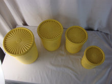 Load image into Gallery viewer, Vintage Tupperware Lemon Yellow Nesting Canister Set 4 Piece
