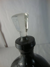 Load image into Gallery viewer, Vintage Black Glass Pinched Waist Decanter with Clear Glass Stopper
