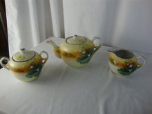 Load image into Gallery viewer, Vintage Japan Handpainted Teapot Creamer Sugar Set Bird over Marsh Motif
