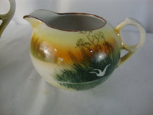 Load image into Gallery viewer, Vintage Japan Handpainted Teapot Creamer Sugar Set Bird over Marsh Motif
