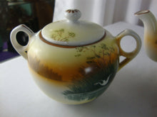 Load image into Gallery viewer, Vintage Japan Handpainted Teapot Creamer Sugar Set Bird over Marsh Motif
