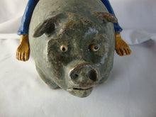 Load image into Gallery viewer, Marvin Bailey Artist Signed Cowboy Farmer with Mini Ugly Face Jug on Green Specked Pig Stack
