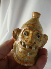 Load image into Gallery viewer, Marvin Bailey Folk Art Potter Tan Orange Beady Eye Mini 3 Tooth Ugly Face Jug
