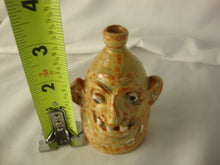 Load image into Gallery viewer, Marvin Bailey Folk Art Potter Tan Orange Beady Eye Mini 3 Tooth Ugly Face Jug
