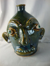 Load image into Gallery viewer, Marvin Bailey Green Tan Buggy Eyes 8 Tooth Ugly Face Jug 8" Height
