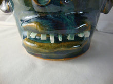 Load image into Gallery viewer, Marvin Bailey Green Tan Buggy Eyes 8 Tooth Ugly Face Jug 8" Height

