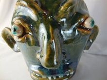 Load image into Gallery viewer, Marvin Bailey Green Tan Buggy Eyes 8 Tooth Ugly Face Jug 8" Height
