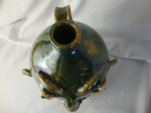 Load image into Gallery viewer, Marvin Bailey Green Tan Buggy Eyes 8 Tooth Ugly Face Jug 8" Height
