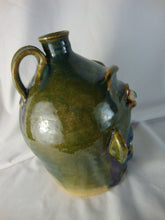 Load image into Gallery viewer, Marvin Bailey Green Tan Buggy Eyes 8 Tooth Ugly Face Jug 8" Height
