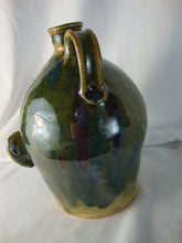 Load image into Gallery viewer, Marvin Bailey Green Tan Buggy Eyes 8 Tooth Ugly Face Jug 8" Height
