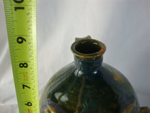 Load image into Gallery viewer, Marvin Bailey Green Tan Buggy Eyes 8 Tooth Ugly Face Jug 8" Height
