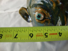 Load image into Gallery viewer, Marvin Bailey Green Tan Buggy Eyes 8 Tooth Ugly Face Jug 8" Height
