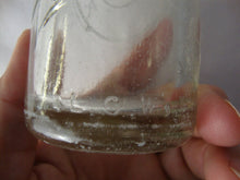 Load image into Gallery viewer, 1949 Dr Pepper 6.5 Ounce Clock Face Back Glass Laurens Glass Works Stamped Greenville SC Bottom
