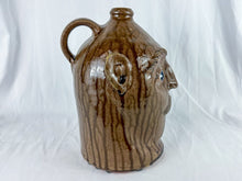Load image into Gallery viewer, Large Mike Craven Signed Brown Ugly Face Jug with Big Round Blue Eyes
