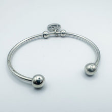 Load image into Gallery viewer, Vintage Sterling Silver Paw Print Charm Open Bangle Bracelet
