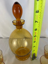 Load image into Gallery viewer, Decanter and Shot Glass Set, 6 Glasses, Amber Glass, MCM with Foot

