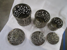 Load image into Gallery viewer, Vintage Metal Filigree Nesting Canister Set of Three
