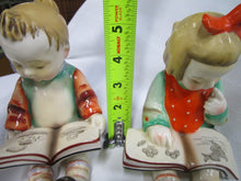 Load image into Gallery viewer, Vintage Gold Castle Japan Young Boy and Girl with Books Figurine Pair
