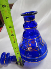 Load image into Gallery viewer, Vintage Cobalt Blue Glass with Gold Tone Trim Decanter
