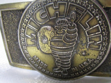 Load image into Gallery viewer, Vintage Michelin Made In USA Tire Man Brass Belt Buckle
