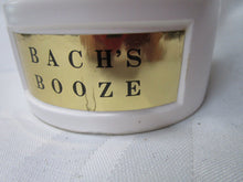 Load image into Gallery viewer, Vintage Bach&#39;s Booze Cream Porcelain Musical Empty Liquor Decanter
